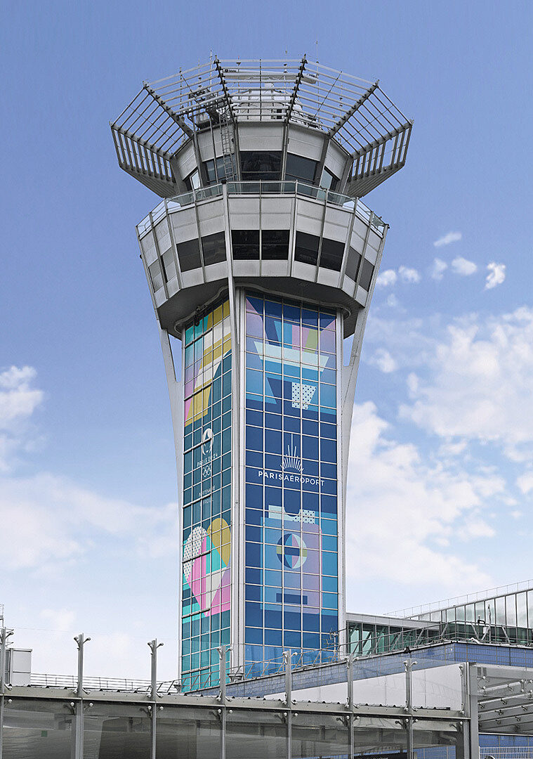 The Orly airport control tower wrapped in an Olympic-themed mural.