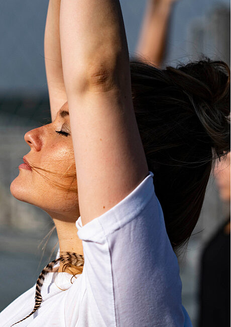 Employee in a breathing or yoga session, representing workplace wellness initiatives