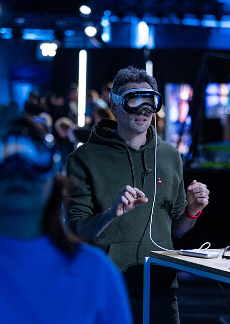 Participant wearing a virtual reality headset during an immersive brand activation